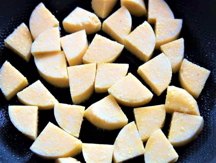 polenta croutons cut into triangles