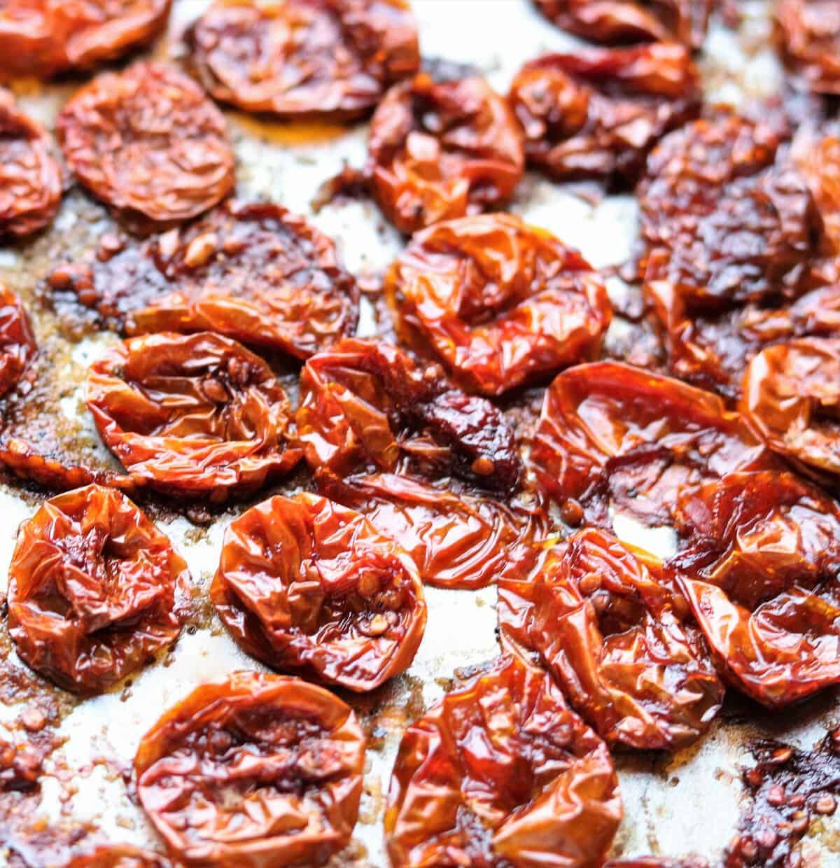 oven dried tomatoes on a baking shet