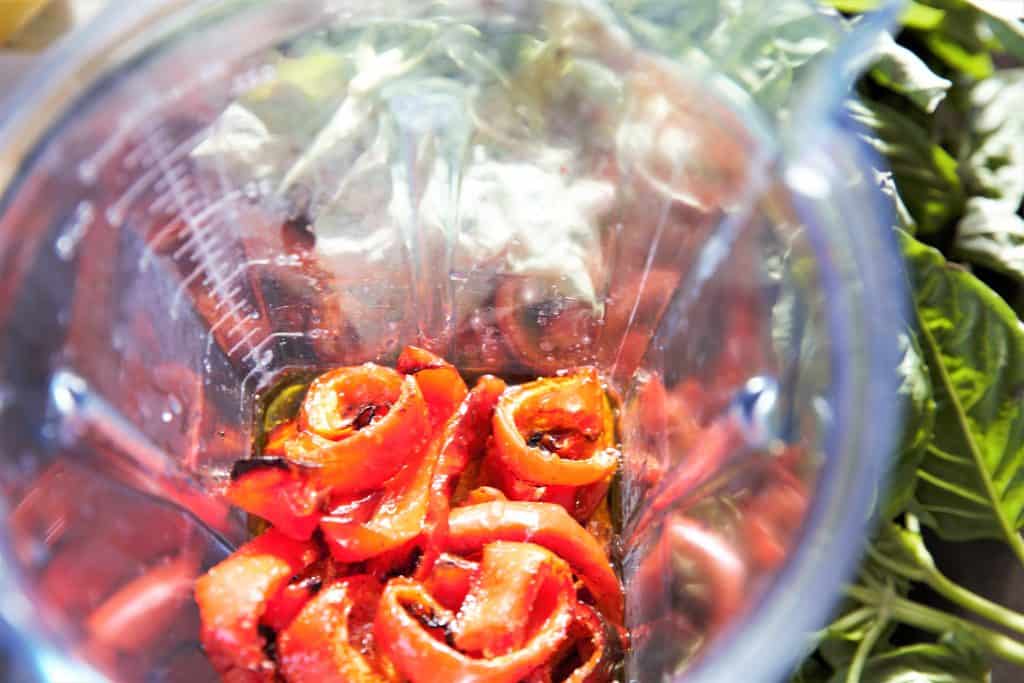 Add roasted peppers to blender