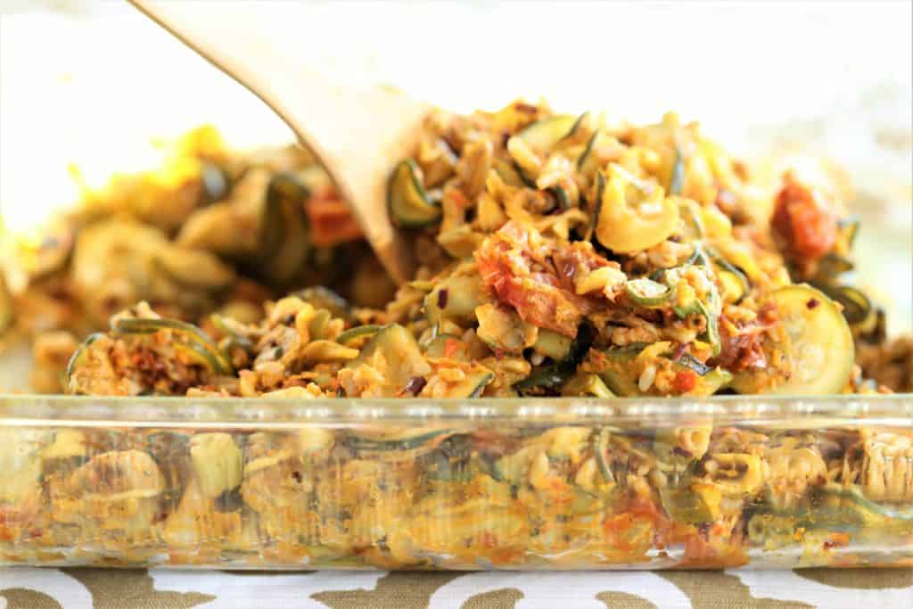 Zucchini is abundant this summer, so we need more dishes that feature this awesome vegetable. Although zucchini ca Zucchini Rice With Roasted Red Pepper Pesto is flavorful and filling.