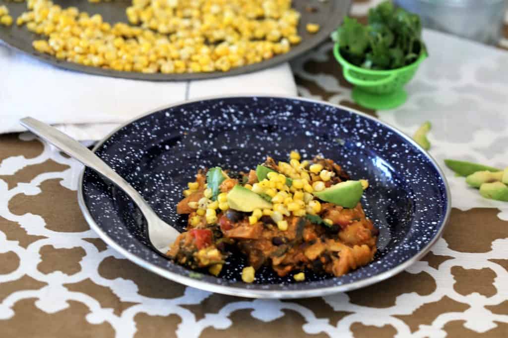 Serve with sliced avocado, cilantro and grilled corn