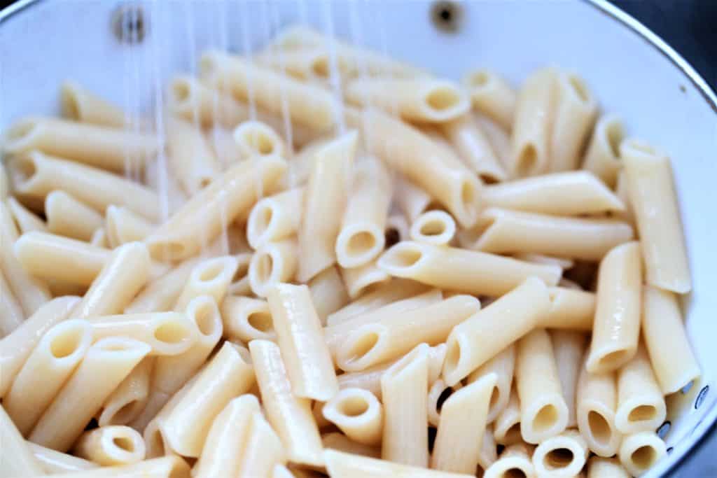 Cook, rinse pasta and add to vegetables