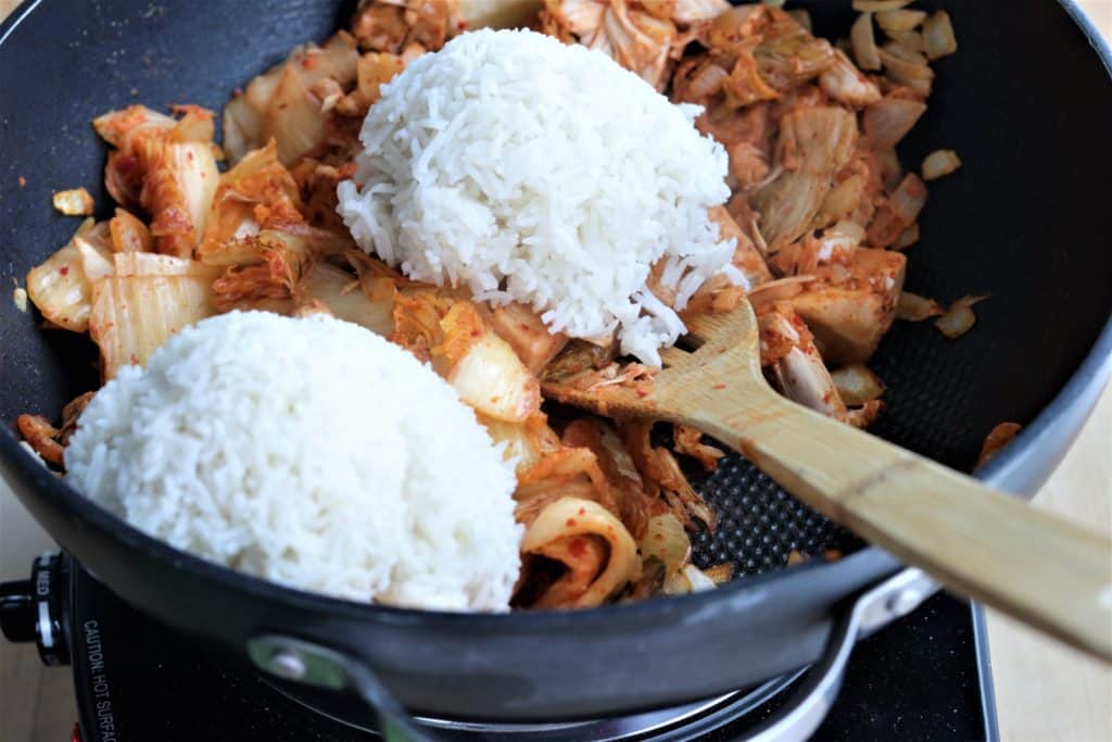 Jackfruit Kimchi Fried Rice in a large skillet with wooden spoon