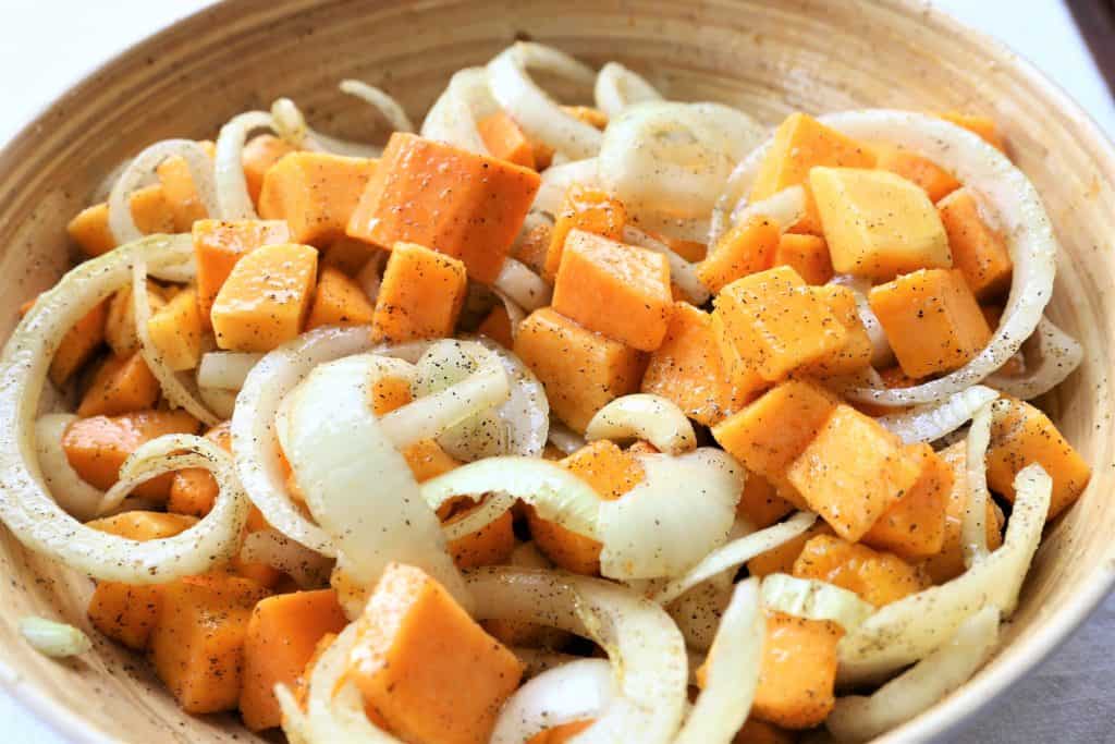 Mix butternut, onions and garlic with olive oil, maple syrup, salt and pepper