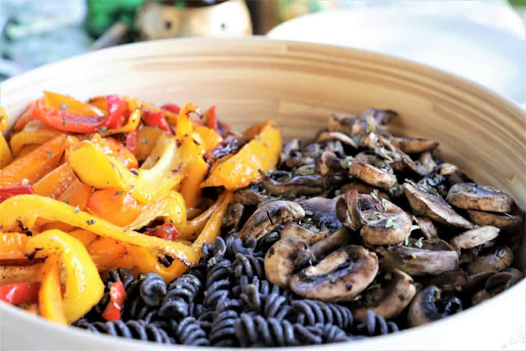 bowl with sauteed mushrooms, peppers, and pasta