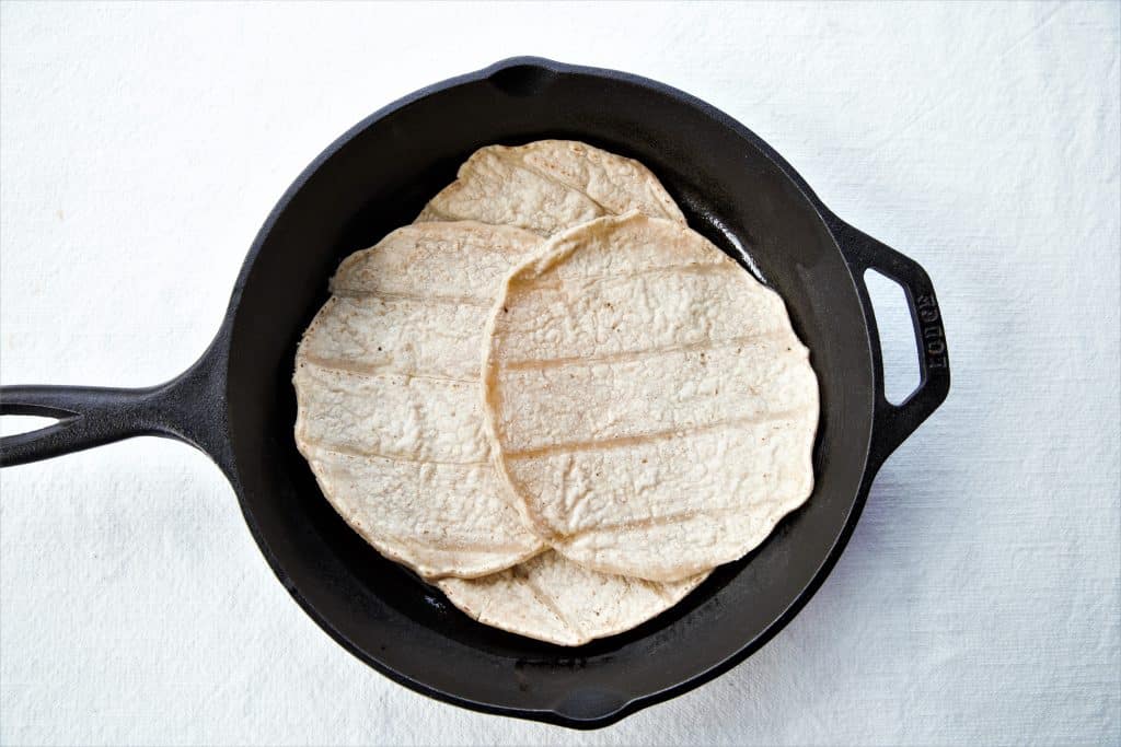 Cast iron pan with tortillas