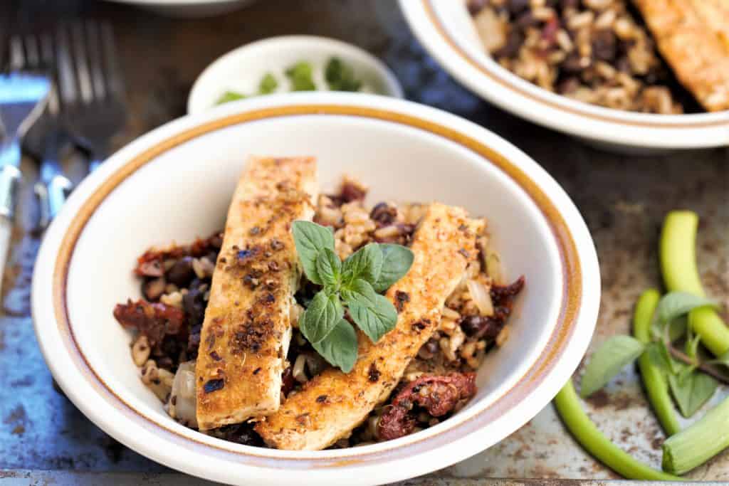 serving of Crispy Cuban Tofu Rice and Beans in a white bowl