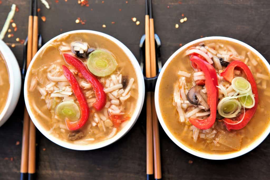 Top with green onions and red pepper flakes