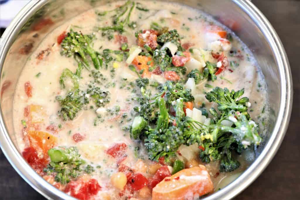 Add coconut milk and vegetable broth