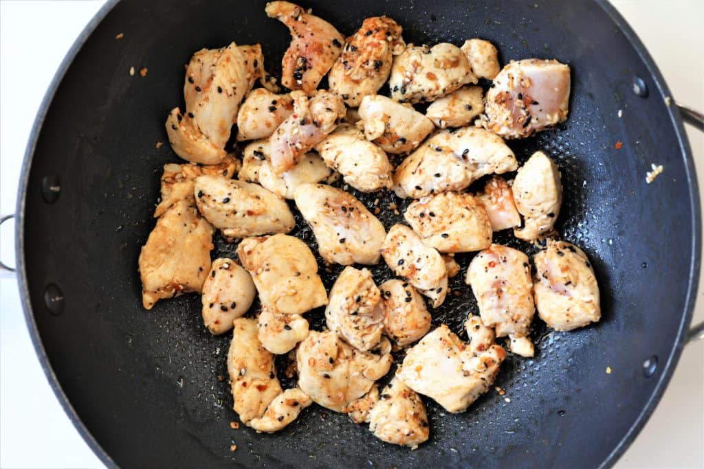 Stirfry chicken in coconut oil and spices