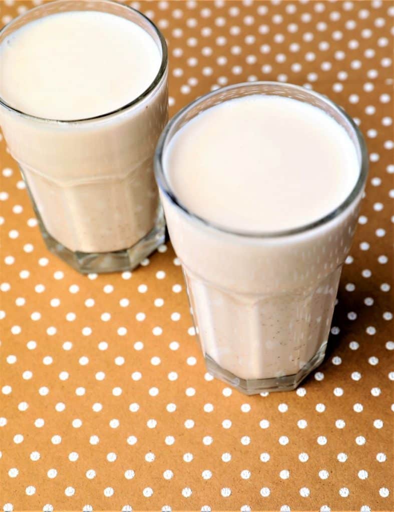 Pour almond milk into glasses