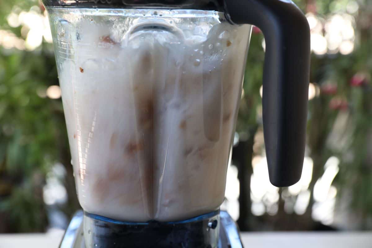 Pour water and almonds, salt and vanilla into blender