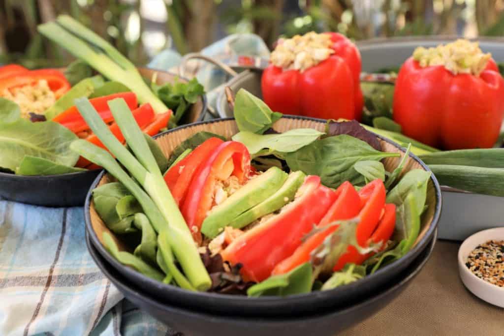 Serve stuffed pepper with greens