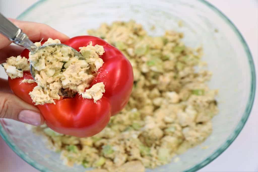 Stuff salad firmly into pepper