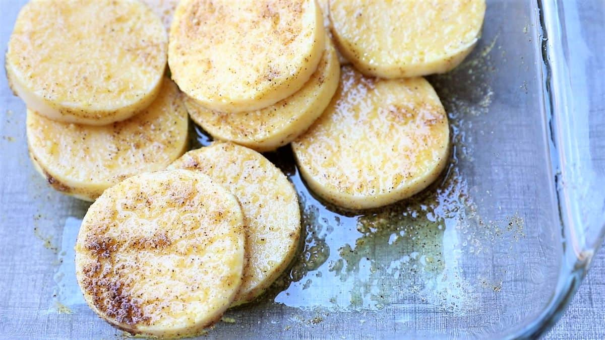 Season polenta with oil, spices